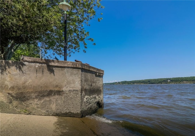 exterior space with a water view