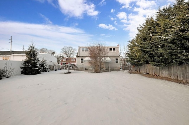 view of yard covered in snow