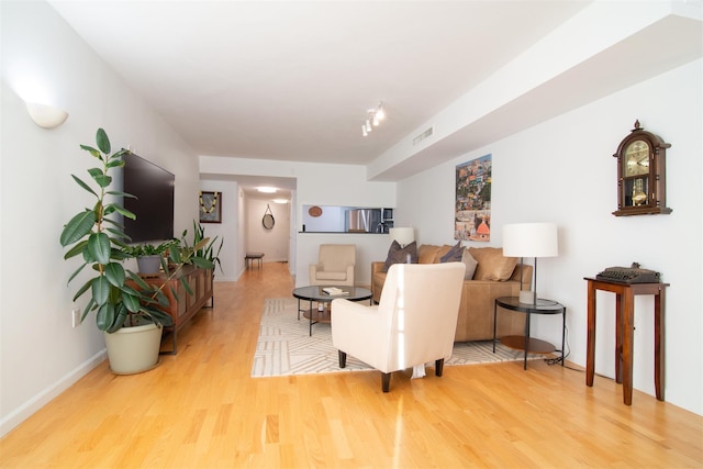 living room featuring hardwood / wood-style flooring