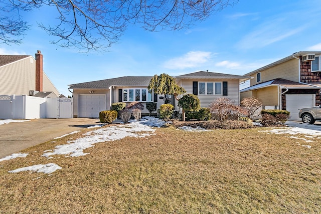 view of front of house featuring a garage and a front yard