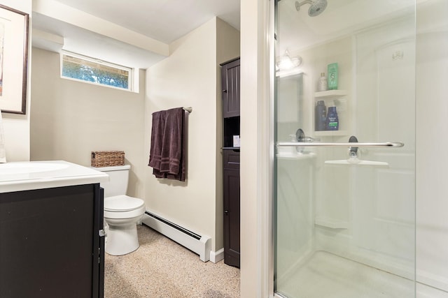 bathroom with vanity, a baseboard radiator, a shower with door, and toilet