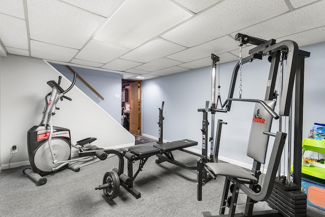 workout area featuring a drop ceiling