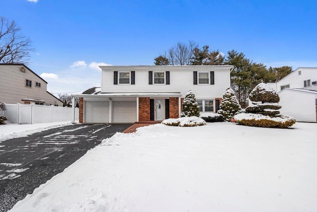 front of property with a garage