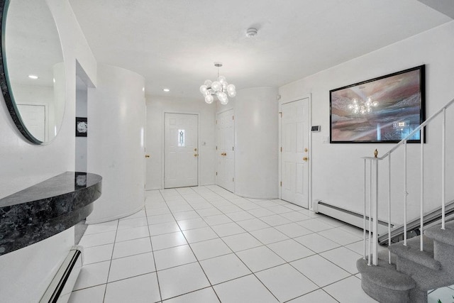 tiled entrance foyer featuring a chandelier and a baseboard radiator