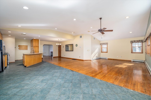 unfurnished living room featuring ceiling fan, a baseboard radiator, dark wood-type flooring, and lofted ceiling