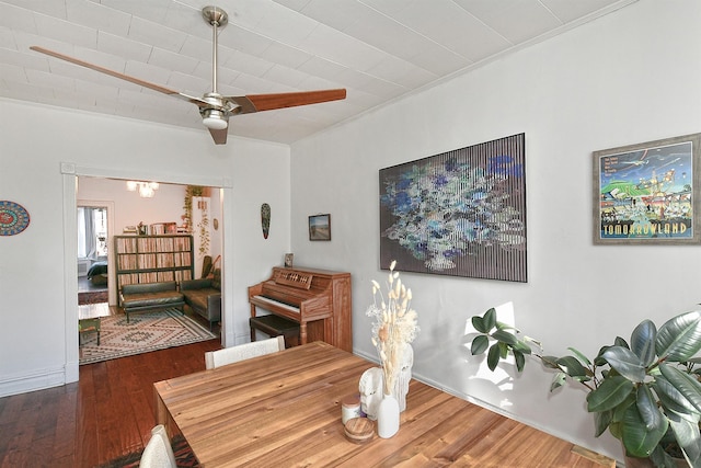 dining room with dark wood-type flooring and ceiling fan