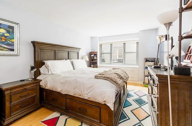 bedroom with light hardwood / wood-style flooring