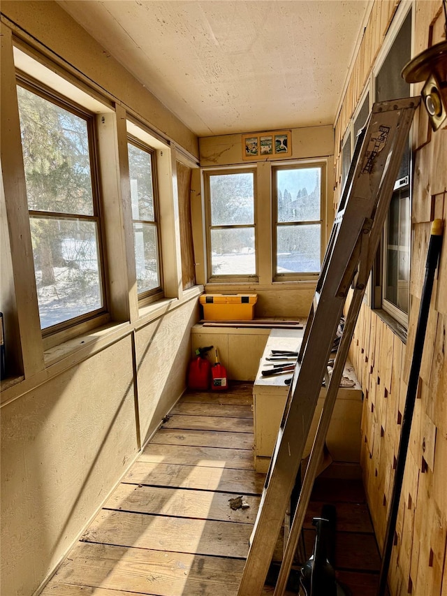 sunroom / solarium featuring a wealth of natural light