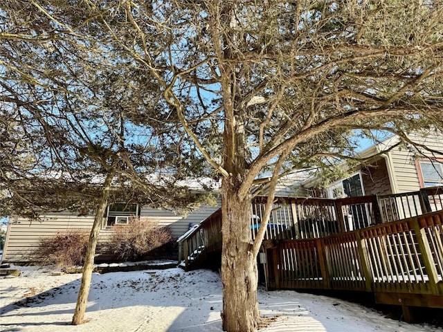 exterior space featuring a wooden deck