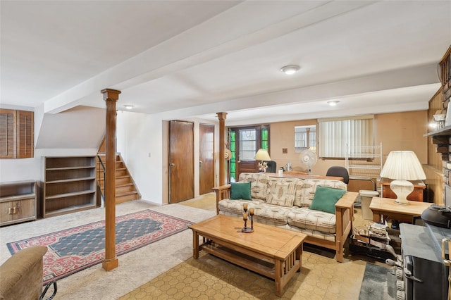 living room with ornate columns