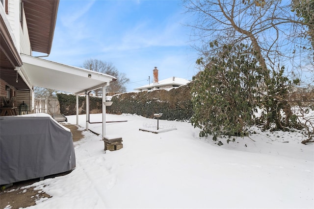 view of snowy yard