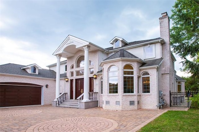 view of front of house with a garage