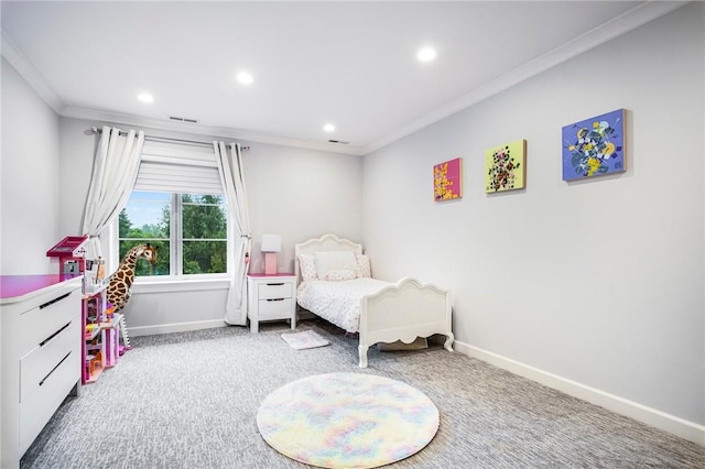 bedroom featuring ornamental molding and carpet