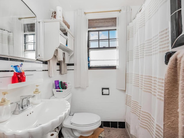 bathroom featuring sink and toilet