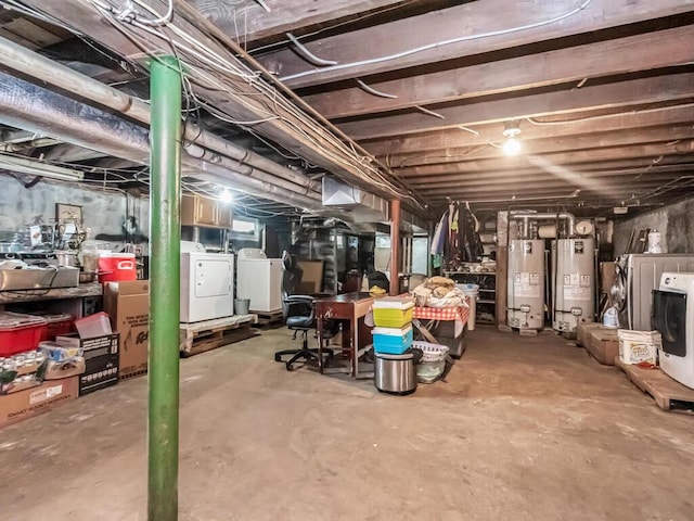 basement with washer and dryer and gas water heater