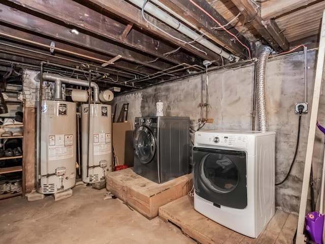 basement with gas water heater and washer and dryer