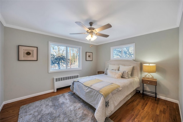 bedroom featuring radiator, ceiling fan, and ornamental molding