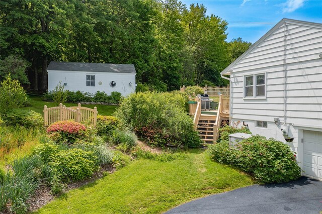 94 S Quaker Hill Rd, Pawling, NY 12564 - view of green lawn with a deck and stairs
