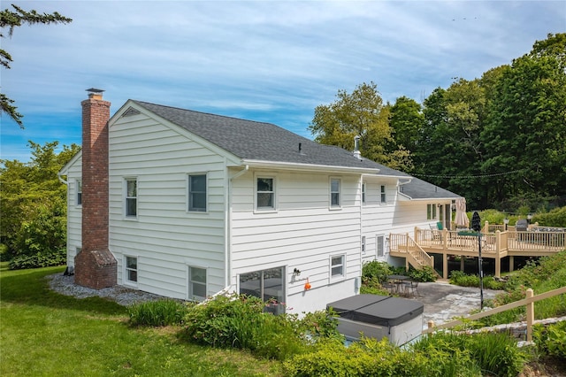 94 S Quaker Hill Rd, Pawling, NY 12564 - rear view of property with a deck, a chimney, a patio, a yard, and a shingled roof