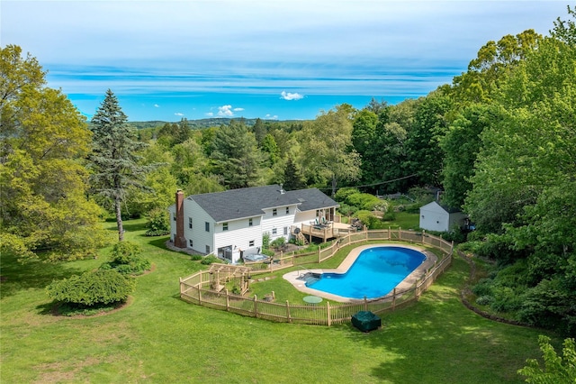 94 S Quaker Hill Rd, Pawling, NY 12564 - view of pool featuring a forest view, a deck, and an outbuilding