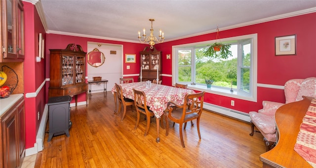 94 S Quaker Hill Rd, Pawling, NY 12564 - dining area with baseboard heating, a chandelier, ornamental molding, and light wood-type flooring