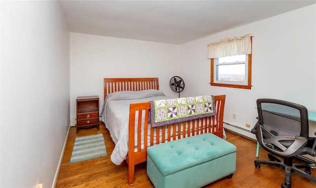 94 S Quaker Hill Rd, Pawling, NY 12564 - bedroom featuring wood finished floors, an office area, and baseboards