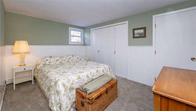 94 S Quaker Hill Rd, Pawling, NY 12564 - carpeted bedroom with a wainscoted wall, baseboard heating, and a closet