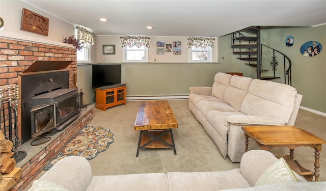 94 S Quaker Hill Rd, Pawling, NY 12564 - living room with a baseboard radiator, carpet flooring, a wood stove, baseboards, and stairway