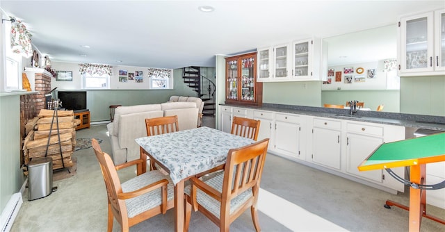 94 S Quaker Hill Rd, Pawling, NY 12564 - dining room featuring stairs, a baseboard heating unit, light carpet, bar, and recessed lighting