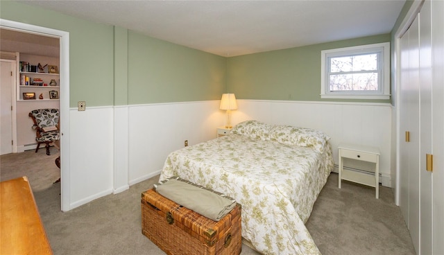 94 S Quaker Hill Rd, Pawling, NY 12564 - carpeted bedroom featuring a baseboard heating unit and wainscoting