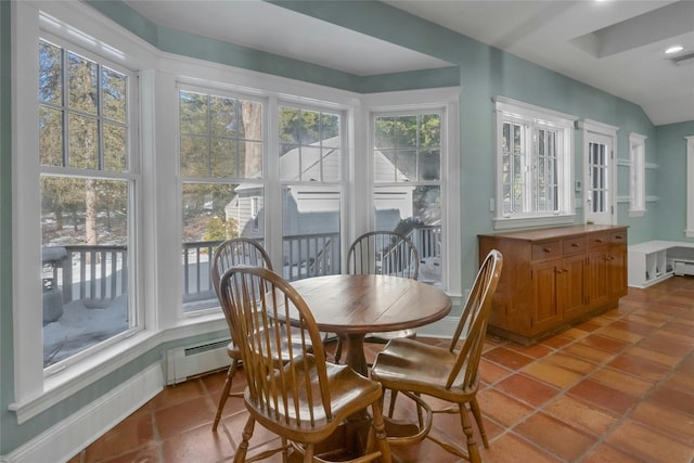 sunroom featuring a baseboard radiator and a wealth of natural light