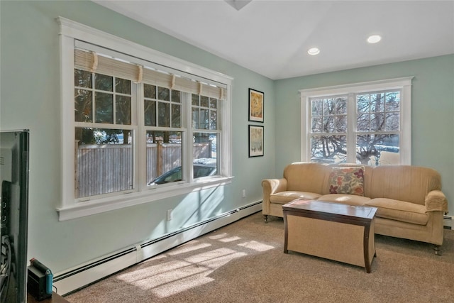 sitting room with carpet floors and baseboard heating