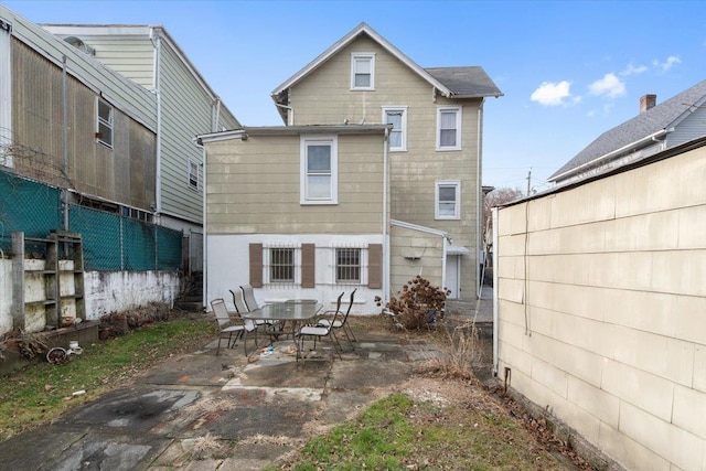 rear view of house featuring a patio area