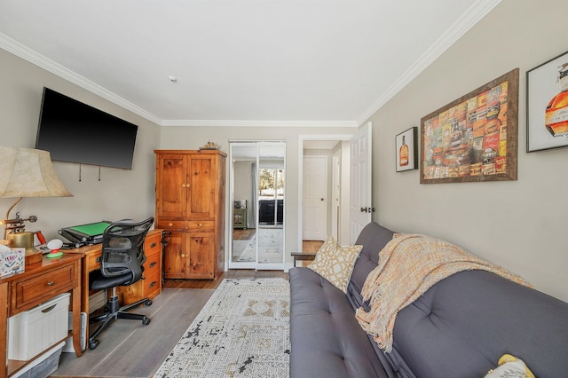 office space featuring ornamental molding and light hardwood / wood-style flooring