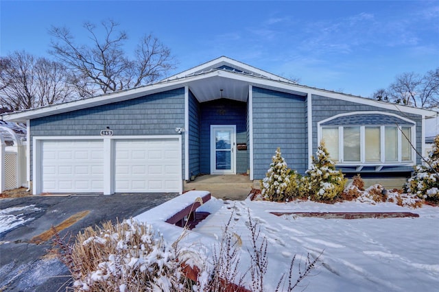 view of front of home featuring a garage