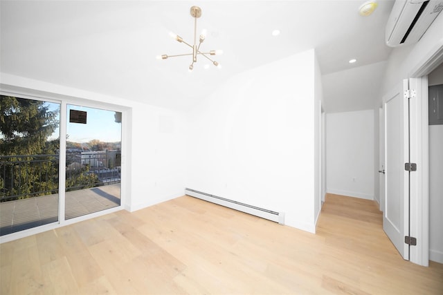 empty room featuring an AC wall unit, a baseboard radiator, lofted ceiling, a notable chandelier, and light wood-type flooring