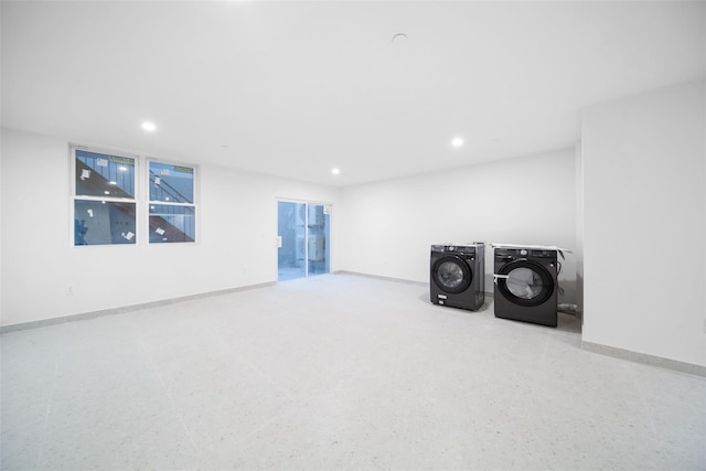 basement with washing machine and clothes dryer