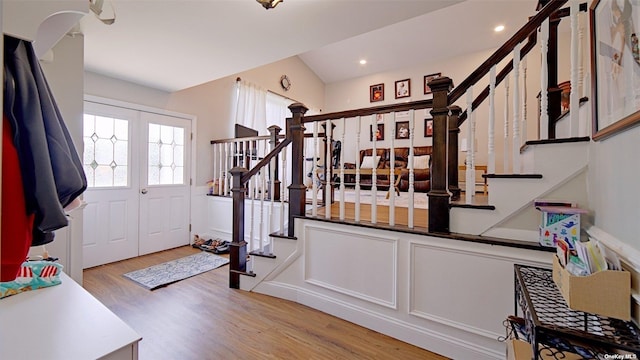 foyer entrance with light hardwood / wood-style flooring