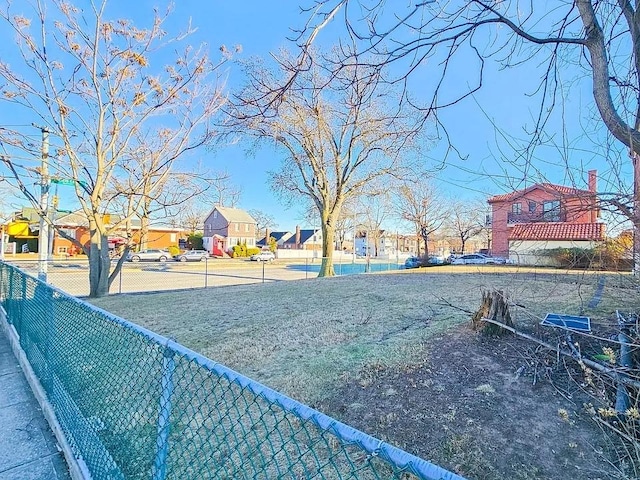 196-64 45th Ave, Flushing, NY 11358 - view of yard with fence and a residential view