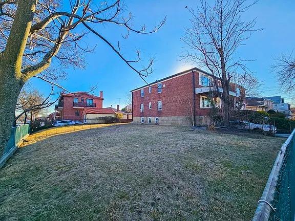 196-64 45th Ave, Flushing, NY 11358 - view of yard featuring fence