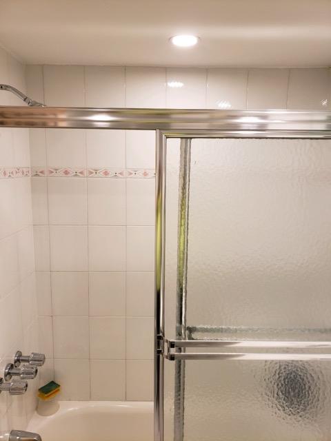 196-64 45th Ave, Flushing, NY 11358 - full bath with combined bath / shower with glass door