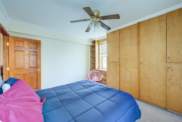 bedroom with a ceiling fan, light carpet, and crown molding