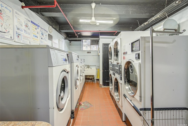 shared laundry area featuring light tile patterned floors, washer and clothes dryer, and stacked washer and clothes dryer