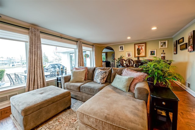 living room with parquet floors and crown molding