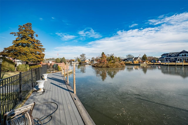 dock area with a water view