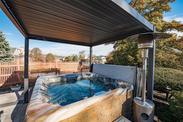 view of patio featuring a hot tub