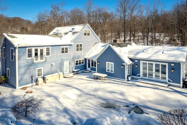 view of snow covered house