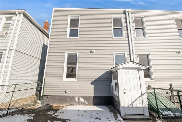 rear view of property featuring a patio