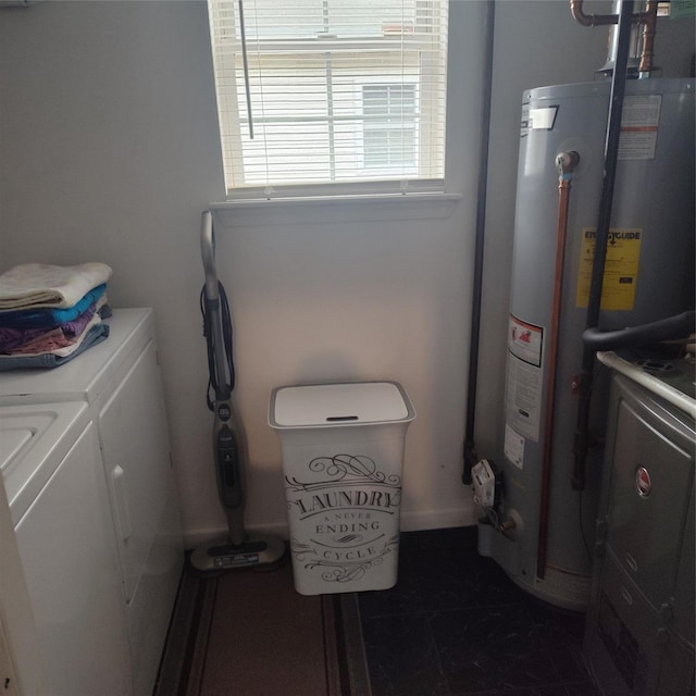 clothes washing area with independent washer and dryer and water heater