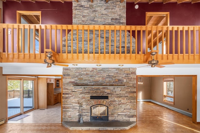 unfurnished living room with a fireplace and a baseboard heating unit